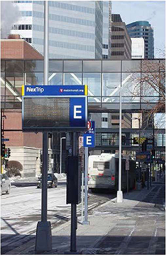 A photo shows a busy urban street.