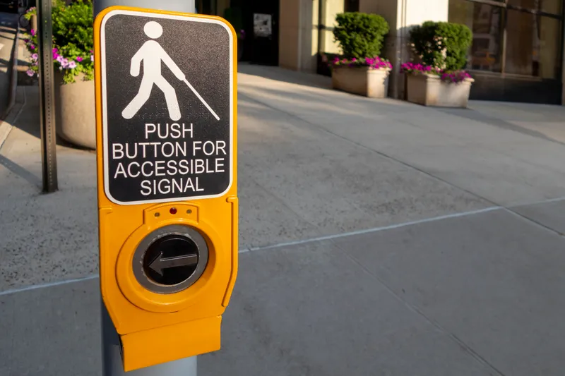 Pushbutton crosswalk signal for blind pedestrians