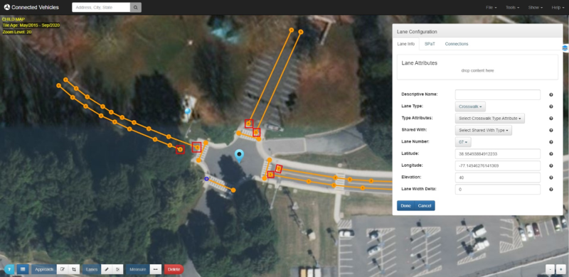 This screenshot demonstrates crosswalk configuration in the Intersection Situation Data (ISD) Message Creation Tool. A window titled 'Lane Configuration' is open on the screenshot. It has the options: Descriptive Name, Lane Type, Shared With, Lane Number, Latitude, Longitude, Elevation, Lane Width Delta. In this screenshot, the Lane Type is set to 'Crosswalk.'' 