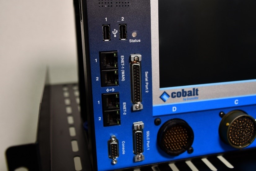 This photo depicts the lower left side of the traffic signal control and shows a series of network cable ports and ports for video and USB cables.