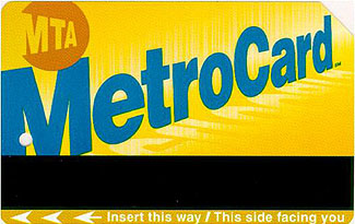 This is an image of the New York City MTA Metrocard. It is a yellow card, with MetroCard printed diagonally across the card in blue. MTA appears off center in an orange circle in the upper left corner of the card. A black strip is on the lower portion of the card. Below the black strip are arrows pointing left with the text "Insert this way/This side facing you."
