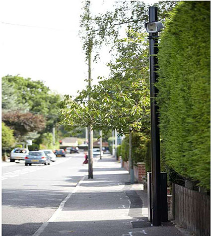 Photo of a typical street and sidewalk on right